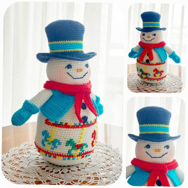 crochet snowman with embroidered carousel horses