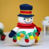 crochet snowman with festive christmas light bulbs