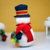 crochet snowman with festive christmas light bulbs