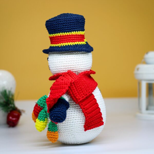 crochet snowman with festive christmas light bulbs