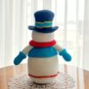 crochet snowman with embroidered carousel horses