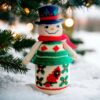 crochet pattern: snowman with embroidered cardinal bird